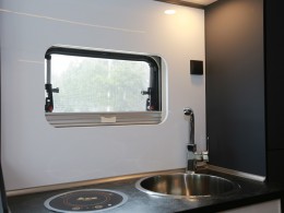 985A1123